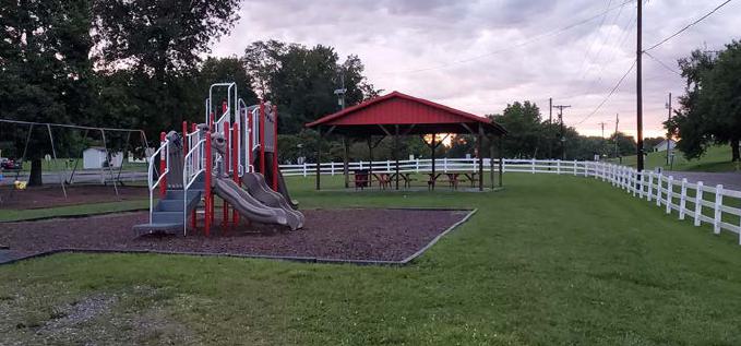 Image of Dr. TF Carter, Midtown Park pavilion, and children's playground